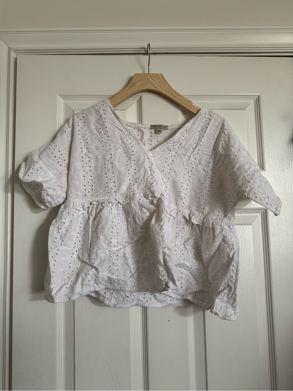Albion White Eyelet V-Neck Peplum Blouse